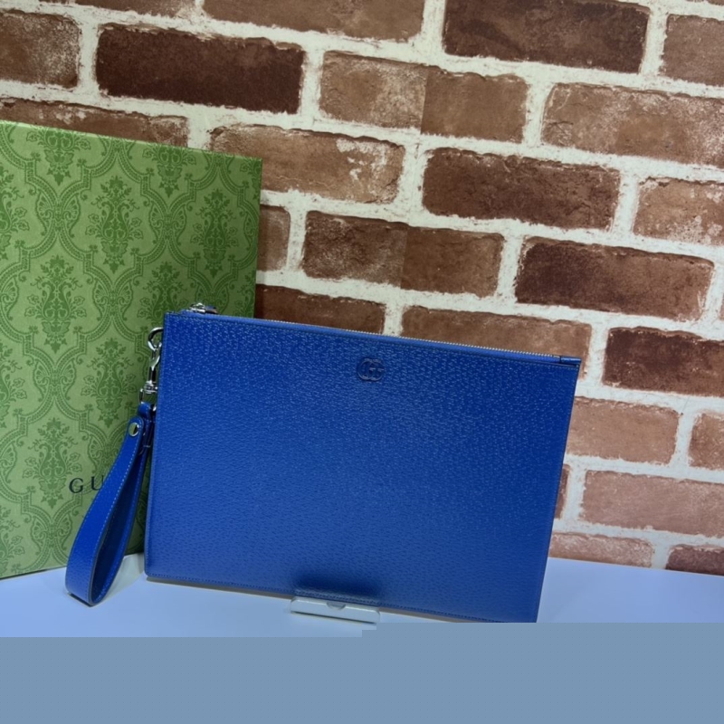 G*u*i clutch bags